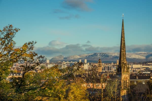 View Over Glasgow From Queens Park With Autumn Leaves and Snow on the Hills in the Background